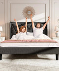 Prime Queen Platform Bed Frame Featuring Adjustable Wingback Headboard And Built In Type C Usb Charging Ports Legit Heavy Duty Wood Slats Support Smooth Assembly No Box Spring Needed Dark Gray Chill Vibe with happy couple in bed.
