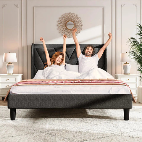 Prime Queen Platform Bed Frame Featuring Adjustable Wingback Headboard And Built In Type C Usb Charging Ports Legit Heavy Duty Wood Slats Support Smooth Assembly No Box Spring Needed Dark Gray Chill Vibe with happy couple in bed.
