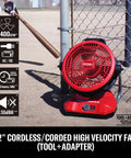 V20 Max Cordless 12 Inch Portable Fan With Dual Power Battery Or AC, 1400 CFM, in outdoor setting near a baseball field.