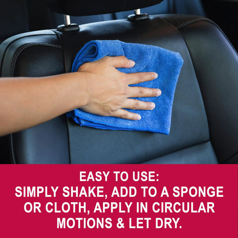 Hand applying Leather Revive Leather Treatment 8 Oz to car seat with blue cloth, showing use for leather surfaces and easy application.