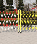 Expandable Retractable Traffic Fence Heavy Duty Safety Barrier For Construction Sites Crowd Control And Transit Hubs Industrial Black Collapsible Gate illustrated in red, white, and yellow colors.