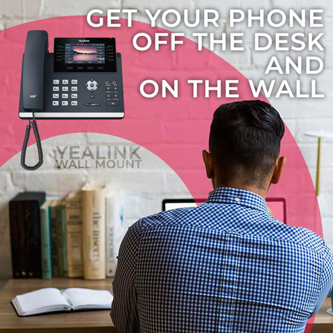 Badass Hold VoIP Desk Phone Wall Mount Bracket Compatible With T46U T46S T46G Kit, mounted Yealink phone near workspace.