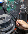 Quarter Inch Drive Impact Socket Set used on machinery, showcasing heavy duty chrome vanadium steel tool in action.