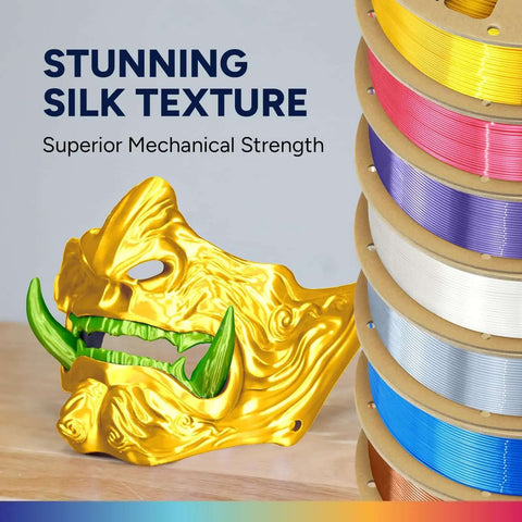 Silk Gold mask printed with Silk PLA Filament 1.75mm Clog-Free with Shiny Silk Finish for 3D Printing, 1kg Spool displayed beside filament spools