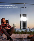 Must Have 2 Pack Solar Camping Lanterns USB Rechargeable LED Lanterns with foldable handle hanging outdoors at sunset