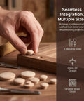 Hand placing Khaki Wood Hole Button Plugs with Mushroom Head into bed frame to conceal screw holes, part of a 160 piece set.