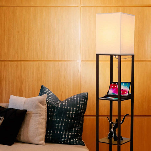 Maxwell Charger Shelf Floor Lamp With USB Ports And Electrical Outlet in a living room, showcasing Havana Brown finish and LED light