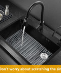 Dope Silicone Sink Protector Mats For Kitchen Sinks Anti Scratch Bottom Mats in grey placed inside black sink with water running