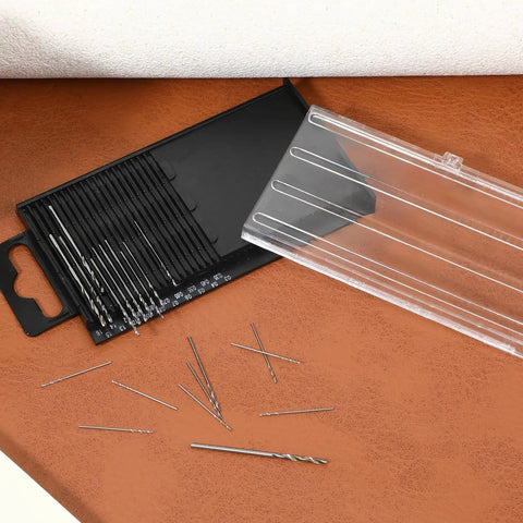 Small Precision Drill Bit Set With 20 Pcs HSS Shank Twist Bits for DIY Projects including case and scattered bits.