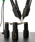 Handsfree Oscilloscope Probe SQ350 350MHz with PCBite holders on electronics workbench for handsfree measurements.