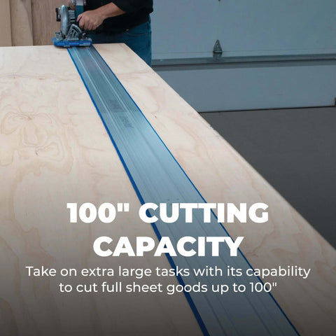 Kreg KMA3700 Accu-Cut XL track saw guide system on a plywood sheet; blue aluminum guide track and a person cutting.