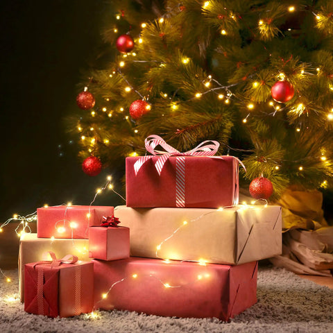 200 Led 72Ft Outdoor Solar String Lights Waterproof With 8 Modes Twinkle Warm White For Patio Tree Christmas Party Wedding Decor No Wiring Needed Perfect For Outdoor Living Spaces Gardens Backyards And Holiday Displays illuminating a Christmas tree with gifts underneath.
