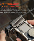 Person inserting battery into DJI Osmo Action 6 Street Snap Kit Camera Cage with Quick Release Hand Grip.
