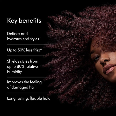 Chitosan Post Style Hair Serum benefits listed beside a woman's curly hair.