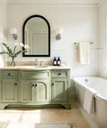 Bathroom with green vanity featuring beefy matte black zinc alloy cabinet knobs 5 pack, single hole pulls for cupboards and dressers.