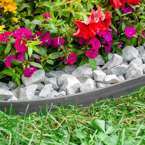 Heavy Duty No Dig Landscape Edging Kit 50 Foot Gray Plastic Edging bordering flower bed with rocks and flowers