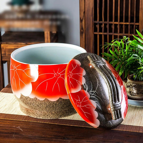 Kick Up Your Kitchen Game With This Handmade Ceramic Storage Jar With Lid For Rice And Pet Food, Retro Porcelain Cylinder Bin For Flour Coffee Beans And Dry Grains, Solid Pantry Keepers That Are Built Different And Look Fresh in vibrant red with floral design.