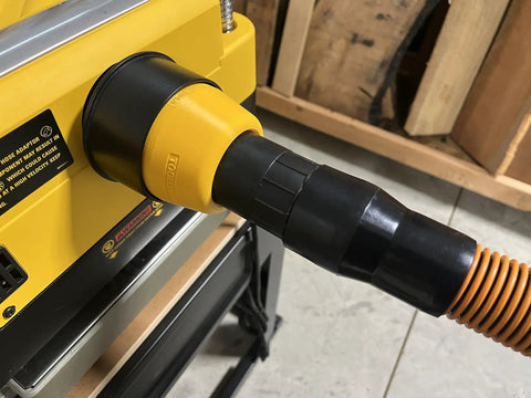 Two And A Half Inch Hose Adapter For Planer Dust Port Fits 735 And 735X Quick Friction Fit Secure Connection shown installed on planer