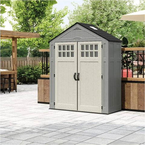 Everett 6x3 Ft Vertical Storage Shed with lockable double doors, windows, and skylight placed on a patio.