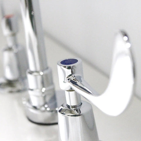 Close-up of polished chrome handle on Commander Gooseneck 8 Inch Widespread Lavatory Faucet Polished Chrome With Lead Free Brass Construction No Fuss 0.5 Gpm Flow Two Handle Lever Three Hole Installation
