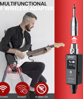 Musician playing guitar with UHF Wireless XLR Adapter System, showing transmitter and receiver functionality, dark gray device