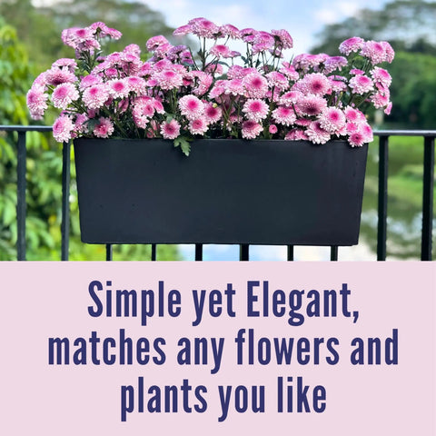 Super Sleek Two Pack Rail Planters For Balcony And Deck Twenty Inch Self Watering Garden Boxes In Matte Black with flowers.