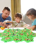 Family playing with Puzzle Racer Car Track Set For Kids Ages 3 To 8 With 10 Puzzle Tracks Snail Car And Road Sign Pieces on table