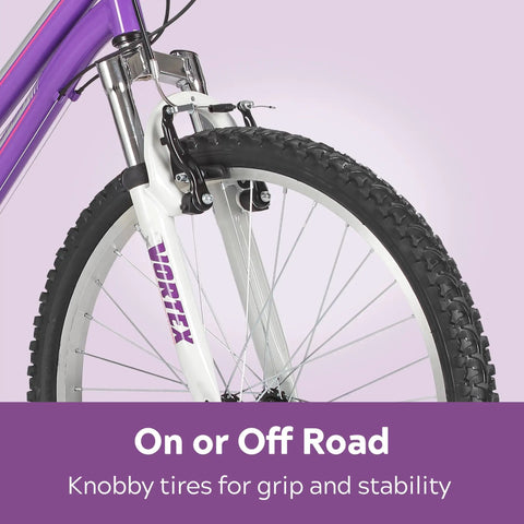 Trail Ready Mountain Bike For Youth And Adults With 24 Inch Wheels, 18 Speed, Steel Frame, knobby front tire in close-up