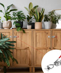 Heavy Duty Toggle Latch Clamp Set With Lock Holes, 304 Stainless Steel on wooden cabinet with potted plants