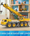 City Mobile Crane Truck Building Set With 997 Pieces showing crane boom and telescopic hook in a room setting.
