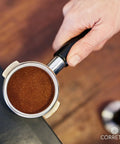 Pro Grade Espresso Tamping Mat With High Grip Food Grade Silicone Black Corner Tamper And Packing Mat To Protect Your Worktop For Busy Cafes And Home Baristas, with portafilter.