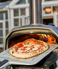 Gas Burner Attachment For Karu 12 2 12G Pizza Ovens in use, showing a pizza baking inside with propane conversion kit.