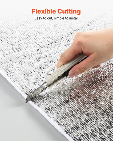 Person cutting Top Shelf Reflective Insulation Roll And Radiant Barrier Thermal Foil for easy installation.