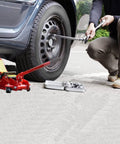 2 Ton Floor Jack Replacement Handle For Car Jack, Horizontal Hydraulic Jack Bar in use on vehicle with tools nearby.