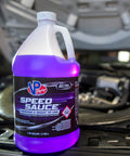 Speed Sauce Injection Fluid For Turbo, Supercharged And High-Compression Engines, 1 Gallon bottle, on car engine background