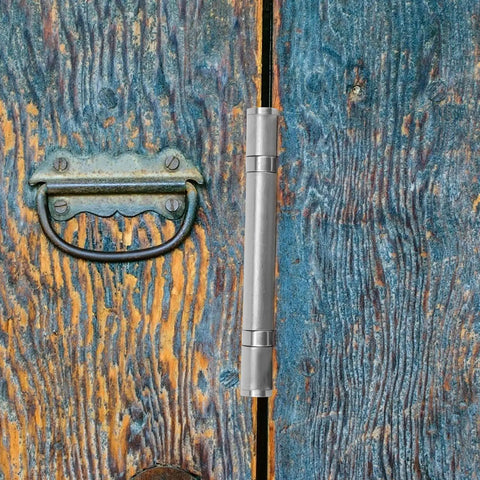 Thickened 4 Inch Stainless Steel Furniture Hinge With Bearing mounted on a rustic wooden door in a home setting
