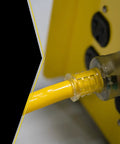 Heavy Duty Outdoor Extension Cord With Lighted End For Safety Waterproof Yellow Jacket 100-Foot 10/3 SJTW Power Cable plugged into outlet.