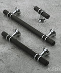 Set Of 10 Matte Black And Silver Cabinet Pulls 3 Inch 76mm Hole Centers Knurled Cabinet Handles on concrete surface