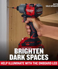 Person using V20 Brushless RP Cordless Quarter Inch Impact Driver Tool Only With 1800 Inch Pounds Torque, driving screw into wood