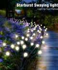 Two Pack 10 LED Solar Firefly Garden Lights Outdoor Waterproof Decorative Lamps illuminating a garden pathway at night.