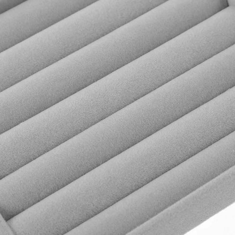 Close-up of the Slick Velvet Jewelry Tray With Anti Scratch Compartments For Rings And Bracelets showing padded foam inserts.