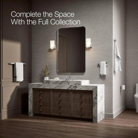 Bathroom with Avid 24 Inch Towel Bar Polished Chrome Bathroom Towel Holder and full collection, marble vanity and wall-mounted mirror.