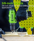 Person using a cordless drill kit with 12V power drill, battery, and charger; lightweight compact design with three eighth inch chuck.