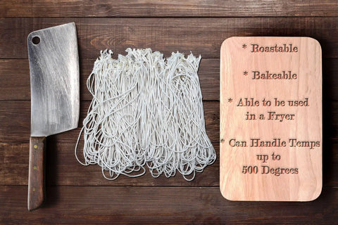 Rotisserie Cooking Ties 50 Heat Safe Cotton Elastic Loops Trussing Twine For Chicken Turkey Roast And Meat Stretch To 22 Inches And Heat Resistant Up To 500 F For Oven Grill And Deep Fry next to cleaver and board