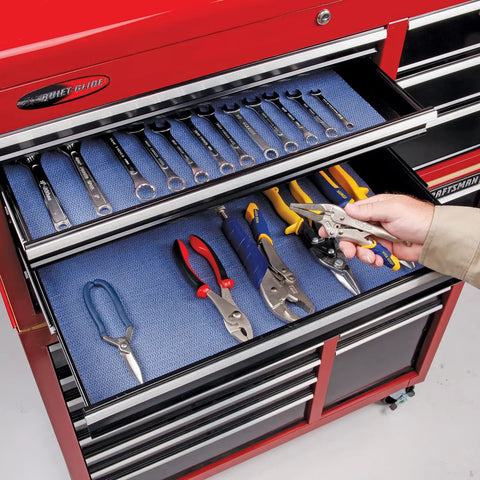Red tool chest with Adhesive-Backed Absorbent Mat For Industrial Floors, Grippy Surface That Stays Put, 16 W X 25 Ft L, Blue.