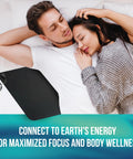 Couple resting with Grounding Mat For Feet And Desk Earthing Pad Kit For Sleep Better Rest Pain Relief Earth Ground Therapy beside them.
