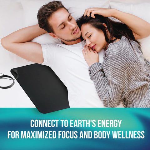 Couple resting with Grounding Mat For Feet And Desk Earthing Pad Kit For Sleep Better Rest Pain Relief Earth Ground Therapy beside them.