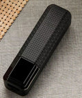 Hella Reliable Solder Free Single 18650 Battery Case Power Supply Enclosure with textured black surface for portable use.