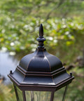 Close-up of Villa Waterproof Outdoor Lamp Post Light in Oil Rubbed Bronze with Crystal Clear Glass, lantern style top view.