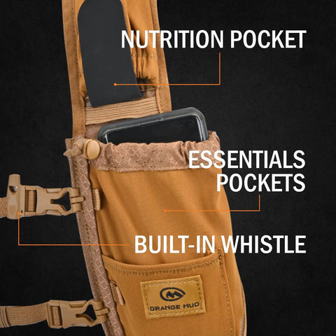 Close-up of Run Ready Hydration Vest Four Point Zero Lightweight Pack showing nutrition and essentials pockets with a phone visible